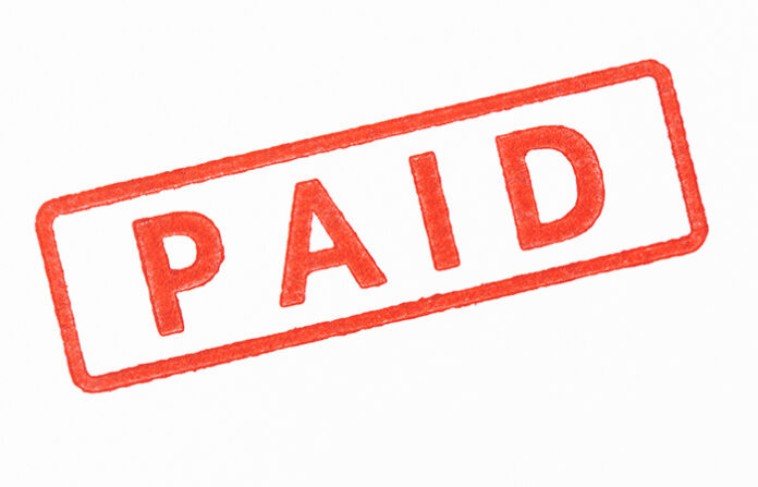 Pay violations resolved