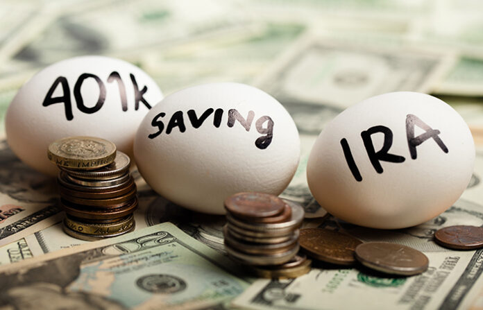 Eggs sitting on money with 401k, saving and IRA written on them to illustrate workers saving for retirement and whether they can live comfortably; FSAs, 401(k)s contributions to see limits rise